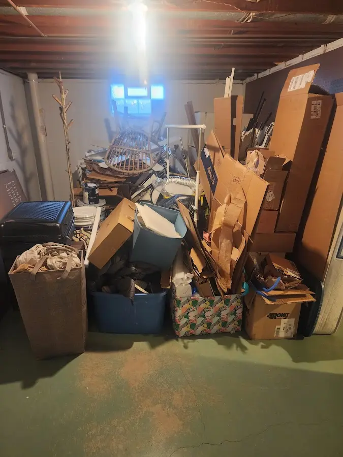 Roll-off dumpster container at job site for 8 Yard Dumpster Rental in Cedarhurst